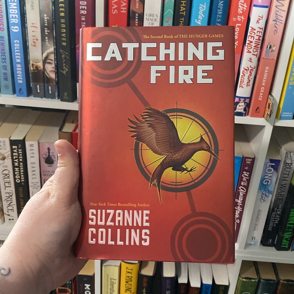 Catching Fire Hardcover Book - Orange Cover